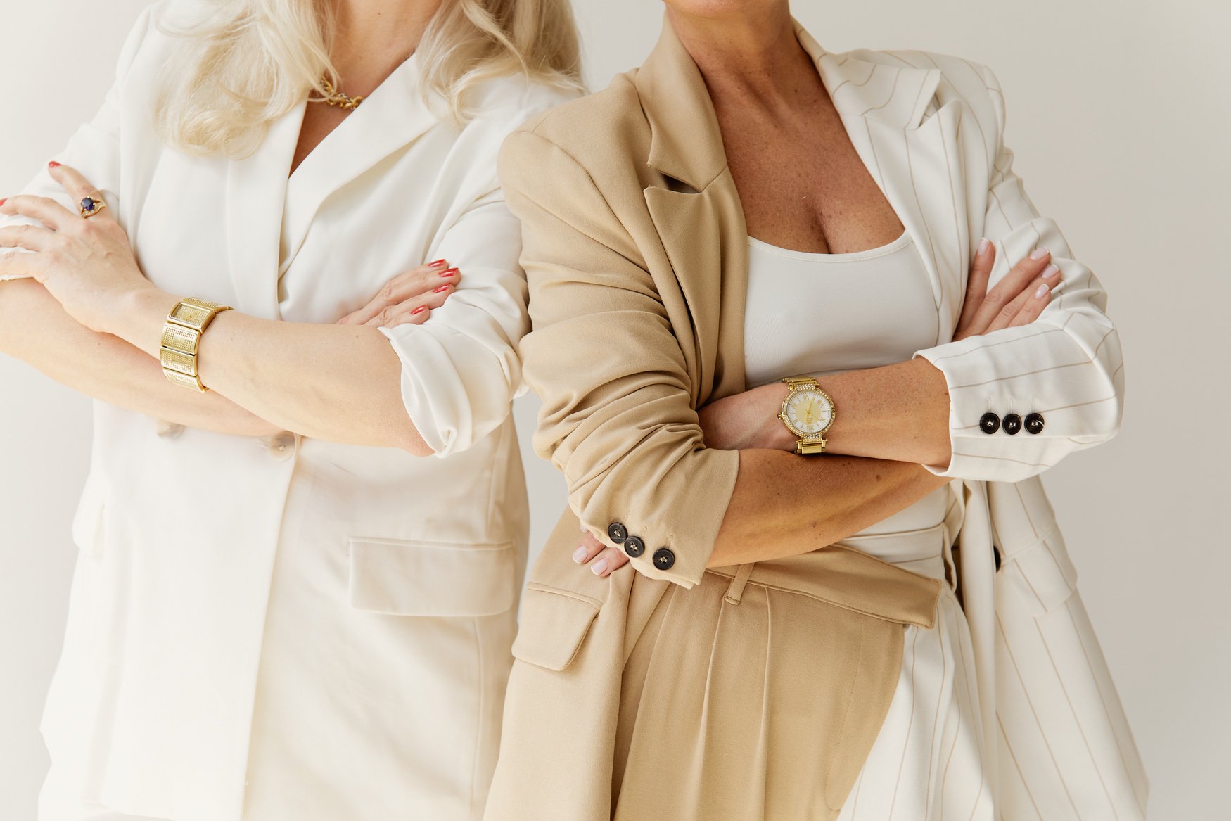 Women Posing with Arms Crossed